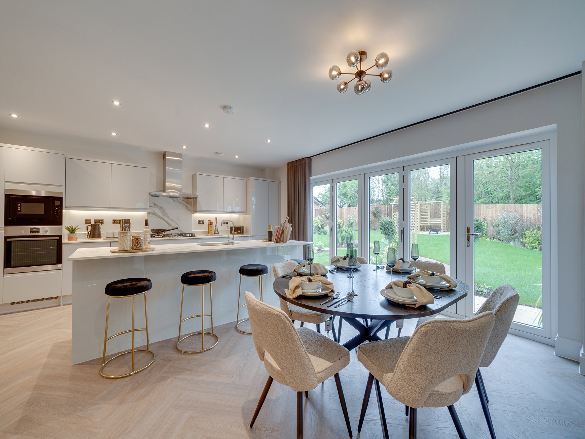 A neutrally decorated kitchen in a show home by Charles Church